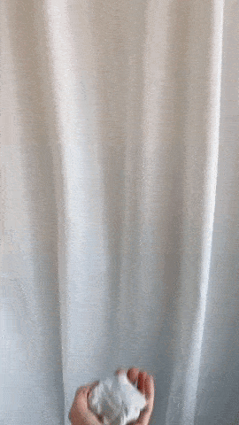 GIF of moulding clay into a wavy pot